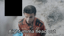 a man in an orange shirt with the words aight imma head out