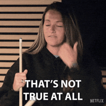 a woman holding a pool cue says that 's not true at all netflix