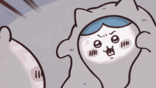 a cartoon drawing of a cat with a blue headband looking at another cat