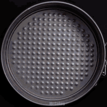 a cake pan with holes in it has the word mirakes on it