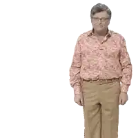 a man in a floral shirt is standing in front of a sign that says show respect