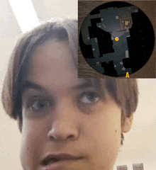 a close up of a person 's face next to a map of a building with the letter b on it