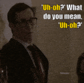 a man in a suit and tie has a quote from freevee on the bottom