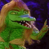 a close up of a green crocodile with long hair