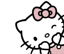 a hello kitty with a pink bow on her head