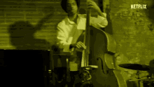 Playing Cello The Eddy GIF - Playing Cello The Eddy Kiss Me In The Morning GIFs
