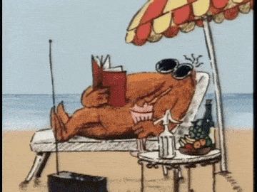 Aubrey and the blue birds relax on the beach