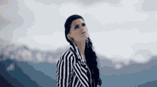 Looking Up Nelly Furtado GIF - Looking Up Nelly Furtado Spirit Indestructible Song GIFs