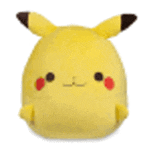 a close up of a yellow stuffed animal with a brown tail and ears on a white background .