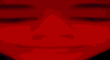a close up of a person 's face in a dark room