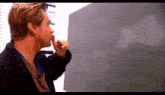 Christopher Nolan Explaining Christopher Nolan Memento GIF