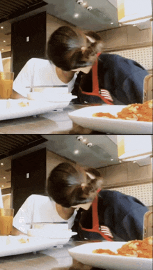 a person sitting at a table with a plate of food and a phone that says ' lg ' on the bottom