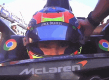 a man wearing a helmet that says jack daniels on it