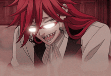 a man with red hair and glasses has a very sharp teeth
