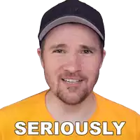 a man wearing a hat and a yellow shirt has the word seriously written on his shirt
