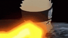 a close up of a person 's face with a fireball coming out of his mouth .
