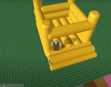 a green object with an arrow pointing upwards