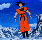 goku from dragon ball z is jumping in the air in front of mountains .