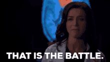 a woman in a lab coat is saying `` that is the battle '' .