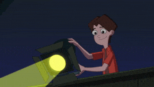 a boy and a girl are standing on a balcony with a yellow light shining on them