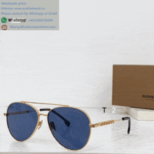 a pair of burberry sunglasses on a white surface