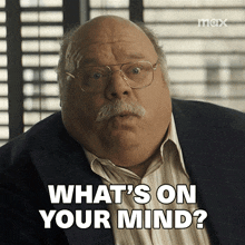 a man with glasses and a mustache asks " what 's on your mind "
