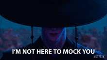 a man in a hat says i 'm not here to mock you netflix