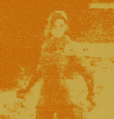 a close up of a yellow and orange background with dots