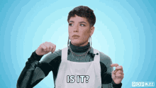 a woman wearing an apron says is it