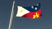 a red white and blue flag with a yellow star and a castle on it