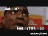a close up of a man 's face with the words balance looking p hat fat on it