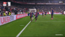 a soccer game is being played and the score is 1 to 1