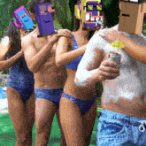 a group of people standing next to each other with their faces covered in foam
