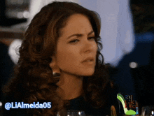 a picture of a woman with the hashtag lialmeida05 on the bottom