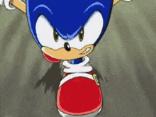 a close up of a cartoon character named sonic the hedgehog wearing red and white shoes