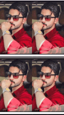 a man wearing sunglasses and a red shirt has his hand on his chin