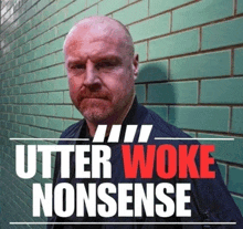 a man is standing in front of a green brick wall with the words utter woke nonsense