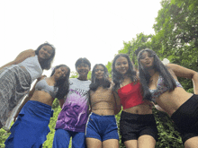 a group of girls are posing for a picture with one wearing a shirt that says valley of the shadows