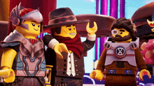 three lego characters are standing next to each other and one has a x on his chest