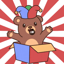 a teddy bear wearing a jester hat is coming out of a cardboard box