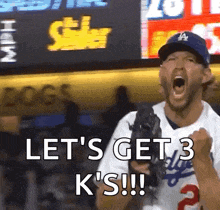 a baseball player is holding a glove and shouting " let 's get 3 k 's !! "