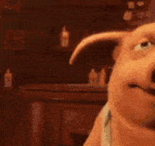 a cartoon pig is smiling and looking at the camera while wearing a tank top .