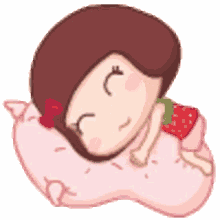 a cartoon girl is sleeping on a pink pillow with a strawberry on her dress