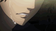a close up of a person 's mouth with a tear coming out of it
