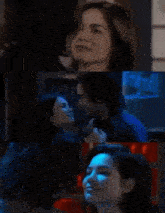 a man and a woman are hugging each other in a room .