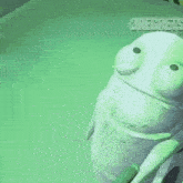 a cartoon character is sitting in a green room with the word regrets written on the bottom .