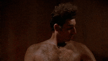 a shirtless man in a sauna with the words " it 's like a sauna in here " below him
