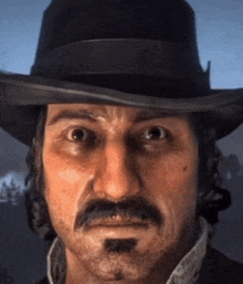 a man with a mustache wearing a black hat