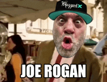 a man wearing a hat that says blizzard x says joe rogan