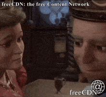 a cartoon of a man and a woman looking at each other with the words freecdn at the top